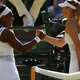 Serena Williams celebrating at the net after beating Maria Sharapova at Wimbledon July 9, 2015